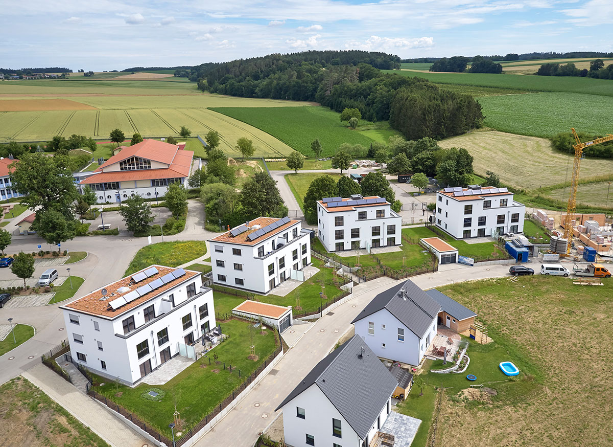 Neubau von vier Mehrfamilienhäusern in Mauern mit Tiefgarage